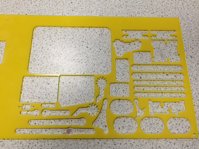 Our own laser-cut MeArm parts, as shared on Thingiverse.  